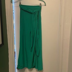 Green wrap skirt with thigh split
